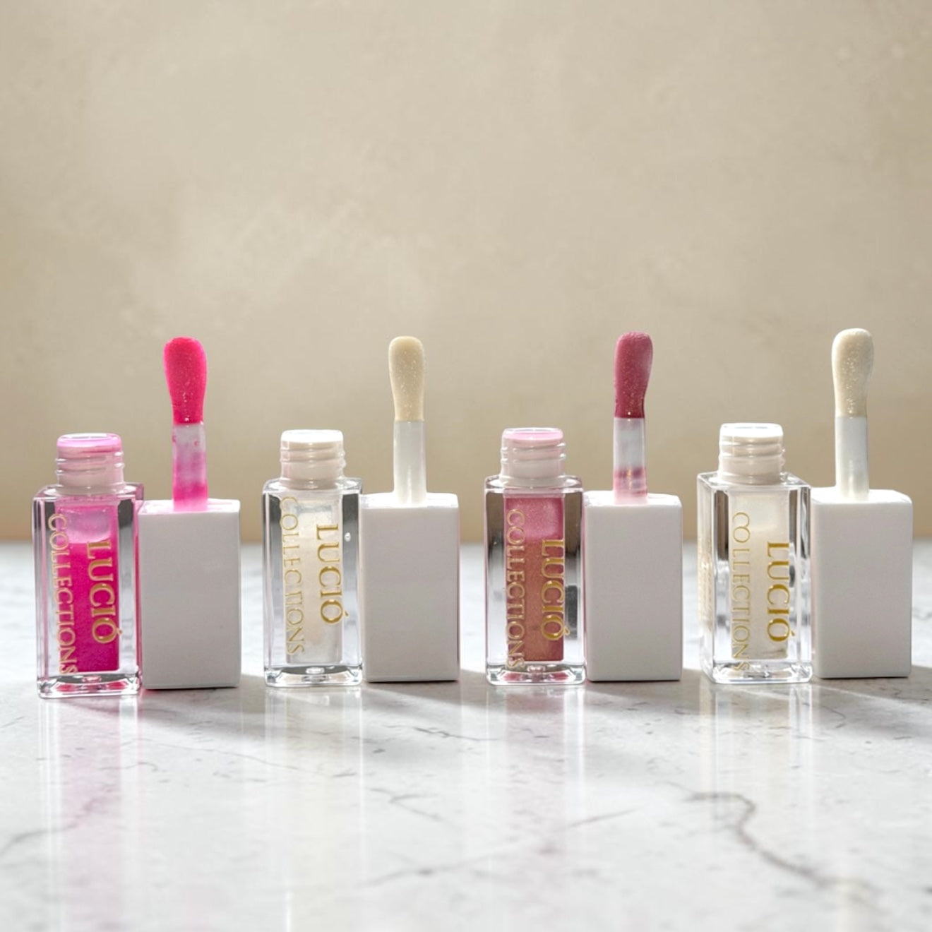 Lució Glow Lip Oil Collection